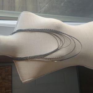 Long multi chain necklace